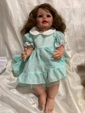 Ying Huan Mei. Adorable Doll With Brown Hair picture