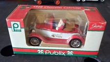 Publix 1928 Chevrolet Cabriolet holiday die-cast toy car featuring Santa picture