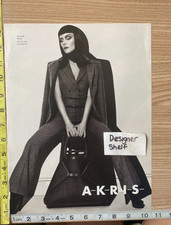 Akris Fashions 2010 Lady In Suit Scene Print Advertisement picture