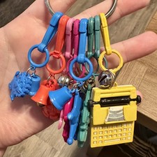 Vintage 1980s Lot of 8 Plastic Clip-On Bell Charms Retro Keychains Collectible ￼ picture