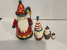 Set of 4 Wooden Christmas Santa Nesting Stacking Dolls  picture