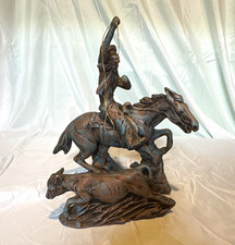 Vintage 1995 DHM cold cast bull along with a 1994 cold cast cowboy on horseback picture