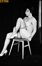 pretty woman in camisole, nylon stockings,  1970s vintage fine art negative picture