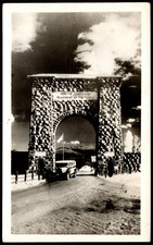 Postcard Yellowstone,Roosevelt Arch and Bus at North Entrance,Gardiner, MT  RPPC picture
