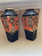 A pair of hand painted Art Nouveau vases Japan. Approximately 10 inches tall. picture