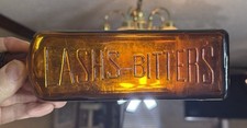 Rare  Antique  Original “   LASH LIVER  “  EMPTY  paper  label  Bitters  Bottle picture