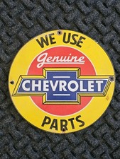 VINTAGE WE USE GENUINE CHEVROLET PARTS  PORCELAIN SIGN picture
