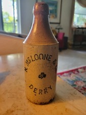 RARE ANTIQUE NORYHERN IRISH STONEWARE N. MCLOONE & CO DERRY BEAR BOTTLE 19TH CEN picture