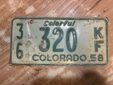 1958 COLORFUL COLORADO LICENSE PLATE 320 A LITTLE DINGED UP picture