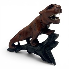 VTG Hand Carved Wooden Sabre Tooth Tiger On A Log Sculpture Glass Eyes Rosewood picture