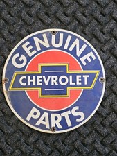 VINTAGE WE USE GENUINE CHEVROLET PARTS  PORCELAIN SIGN. picture