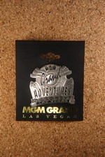 Vintage 1990s MGM Grand Adventures Las Vegas Silver Black Pin Badge Carded picture
