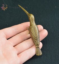 Antique bronze ware with brass and a solid long billed hummingbird picture