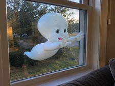 Casper the ghost through the window decoration picture