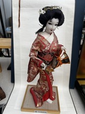 A set pf two A Vintage geisha doll and vintage Japanese ningyo. picture
