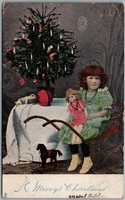 Vintage Tuck's A Merry Christmas Child w/ Doll, Toy Horse Postcard M254 picture
