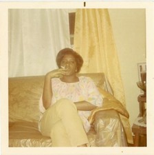 Vtg 1970s Found Photo African American Woman Smoking Cigarette Inside Snapshot picture