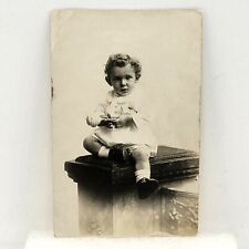 Vintage RPPC Seated Baby Toddler Boy Rattle Curly Hair Real Photo Postcard picture