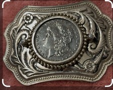 vintage Western-style belt buckle an authentic or replica Morgan silver dollar picture