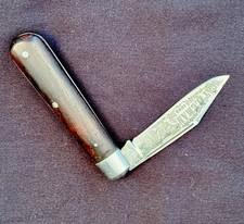 Vintage 1985 Fight’n Rooster Frank Buster “Cattleman” Pocket Knife Wood Handles picture