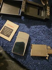 Vintage 1980 Zippo Slim High Polish Chrome Lighter #1610 UNFIRED NOS  W/ Box picture
