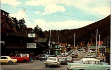 Postcard Evergreen Business District Street View Mountain Pharmacy Colorado D84 picture