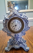 19th Century  French Faience Mantel Clock with Cherub picture