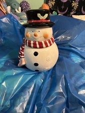 A Snowman Cookie Jar with Lid That Can Be Used Any Time. picture