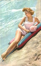 Bathing Beauty on Air Mattress at Water's Edge - Vintage Postcard - circa 1955 picture