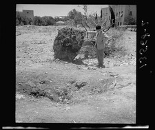 Photo:Jerusalem Israel Hotel King David Bombing 1946 Ruins Man at Crater picture